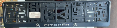 Рамка для номера с защелкой с надписью ''CITROEN'' (рельефная) серебро 112/1-CN-c/028-055